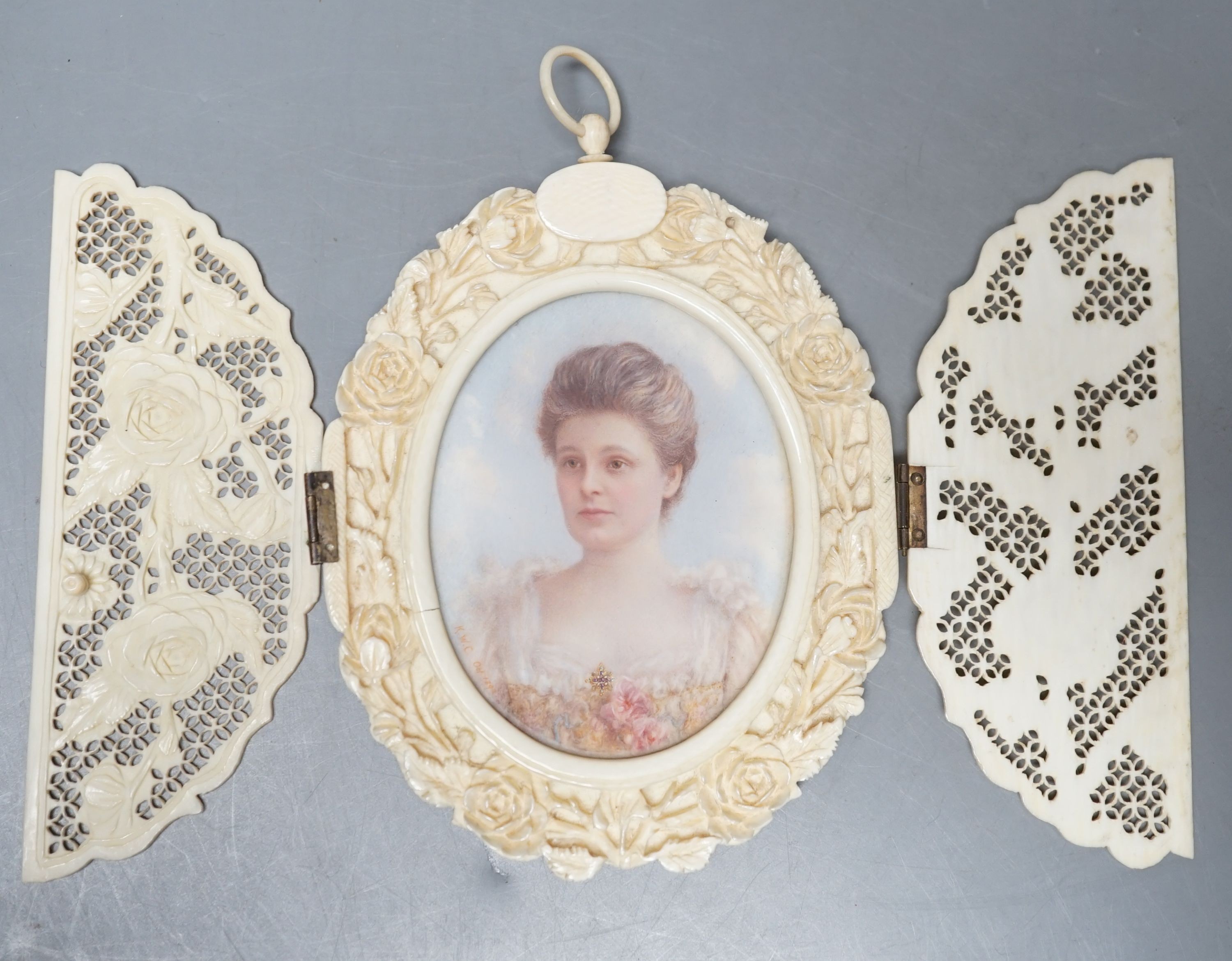 A carved and pierced ivory framed miniature. ‘Edith wife of C.Constable Curtis Esq. Collingshaw Newark - Painted by K.Wilfred Collyer 8th October 1892’ to reverse, 11.5cm high